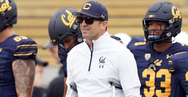 Cal Golden Bears head coach Justin Wilcox with his team before a college football game.